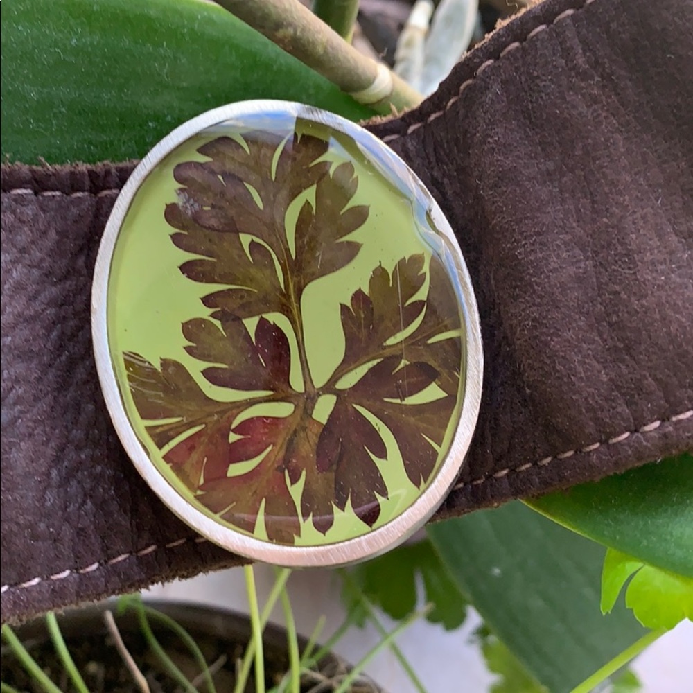 Leather snap bracelet with real leaf accent